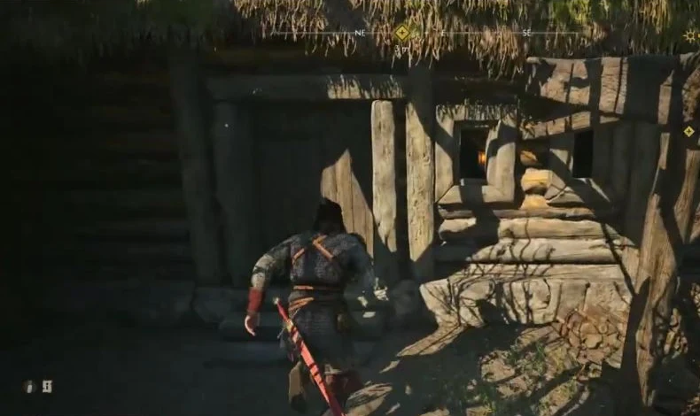 Use the raised wooden approach between the heavy posts to enter the old inn through this doorway.