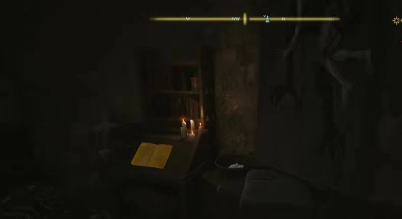 Inspect the open book highlighted on the stand beside the candles.
