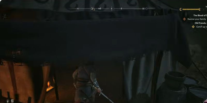 Enter the tent through its open front, beside the lamp. Turn right once inside.